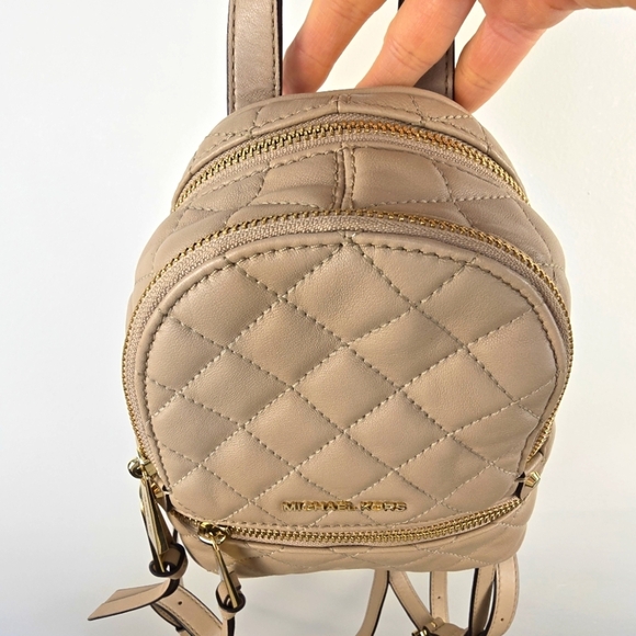 Michael Kors Cream Quilted Backpack with Gold Accents - Picture 9 of 17